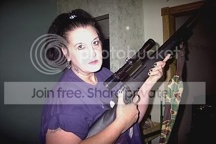 traceywith7mmsniperrifle.jpg